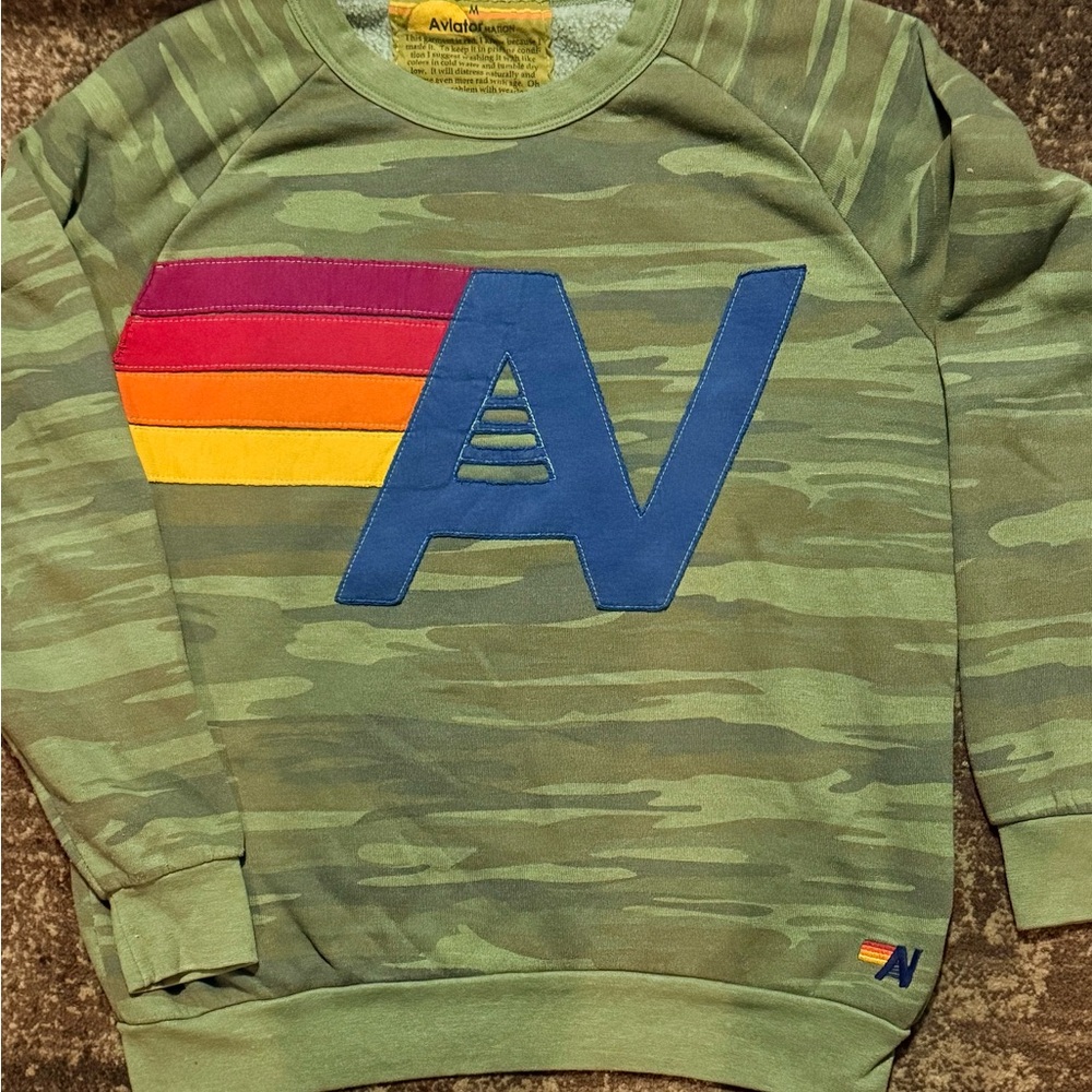 Aviator Nation Green Camo Sweatshirt with Blue Logo and Red-Orange-Yellow Stripe